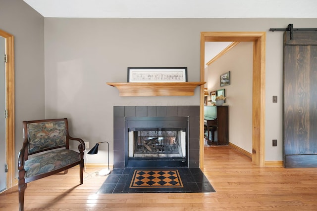 364 Morgan Ln, Columbus, OH 43230 - detailed view of wood finished floors, a fireplace, and baseboards
