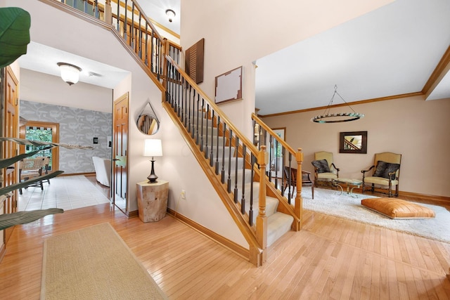 364 Morgan Ln, Columbus, OH 43230 - stairs with baseboards, hardwood / wood-style flooring, and wallpapered walls