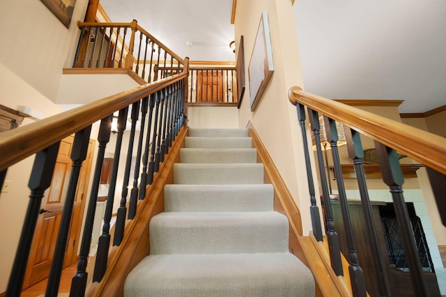 364 Morgan Ln, Columbus, OH 43230 - staircase featuring crown molding