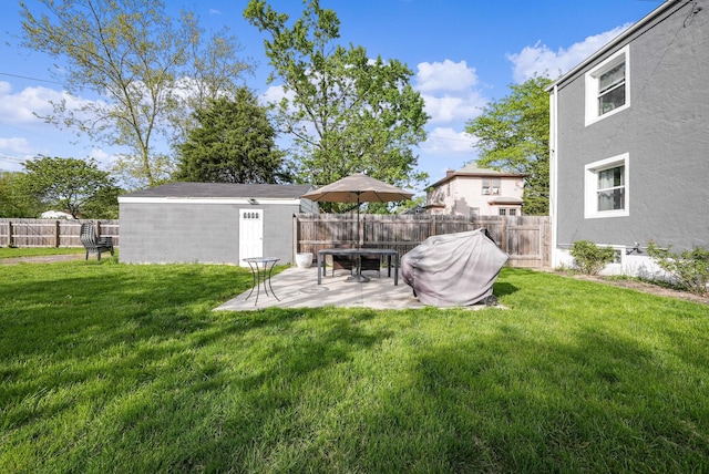 1081 Harrisburg Pike, Columbus, OH 43223 - view of yard featuring a patio area and an outbuilding