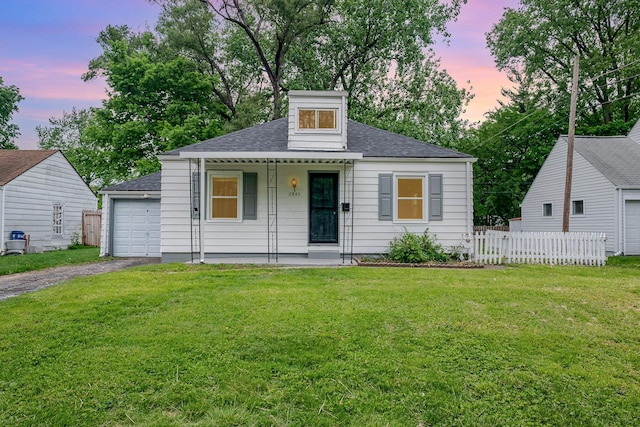 2845 Homecroft Dr, Columbus, OH 43211 - bungalow with covered porch, driveway, and roof with shingles