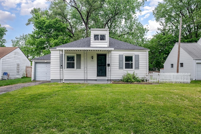 2845 Homecroft Dr, Columbus, OH 43211 - bungalow-style home featuring covered porch, roof with shingles, and asphalt driveway