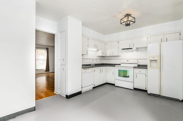 1824 Willoway Cir S, Columbus, OH 43220 - kitchen with white appliances, dark countertops, range hood, a sink, and white cabinets