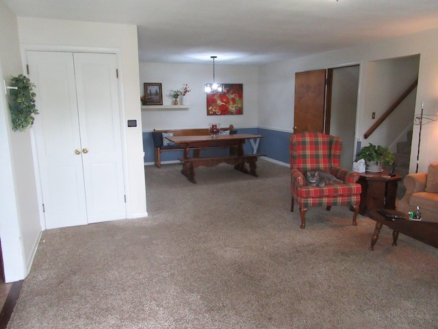 302 W Hubert Ave, Lancaster, OH 43130 - rec room featuring carpet floors, baseboards, and a chandelier