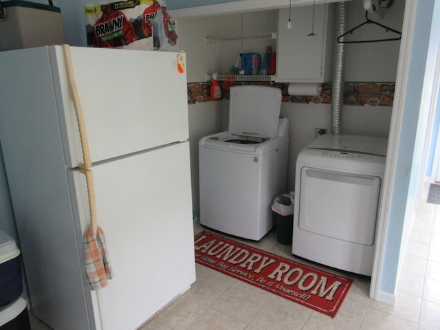 302 W Hubert Ave, Lancaster, OH 43130 - laundry room with separate washer and dryer and light tile patterned floors