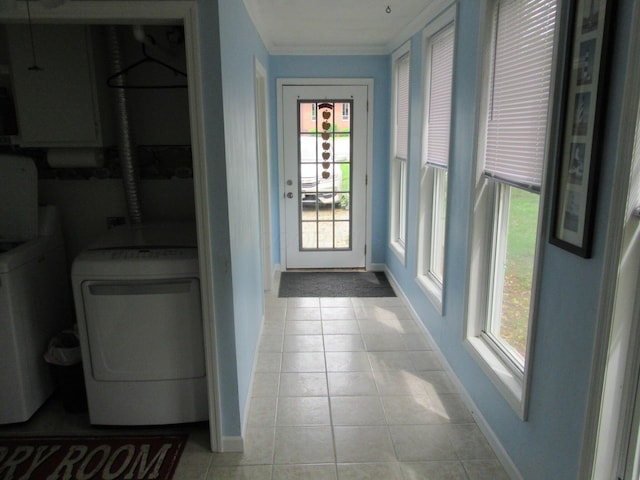 302 W Hubert Ave, Lancaster, OH 43130 - clothes washing area featuring washer / dryer, baseboards, light tile patterned floors, and ornamental molding