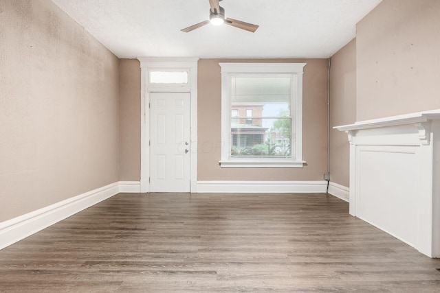 438-440 S Ohio Ave, Columbus, OH 43205 - unfurnished living room featuring ceiling fan, wood finished floors, and healthy amount of natural light