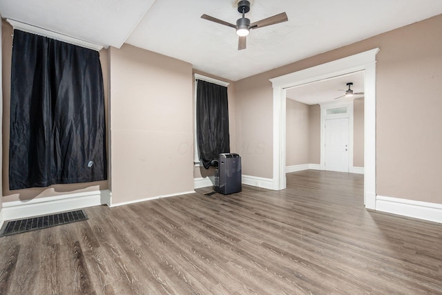 438-440 S Ohio Ave, Columbus, OH 43205 - spare room with ceiling fan, wood finished floors, and baseboards