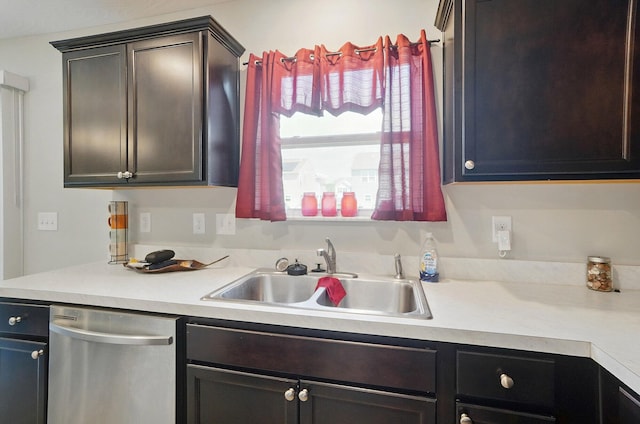 5416 Branchville Dr, Canal Winchester, OH 43110 - kitchen featuring stainless steel dishwasher, a sink, and light countertops
