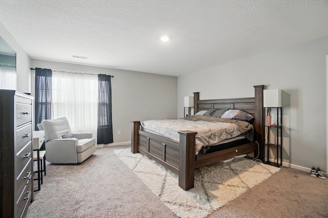 5416 Branchville Dr, Canal Winchester, OH 43110 - bedroom featuring light colored carpet, baseboards, and a textured ceiling