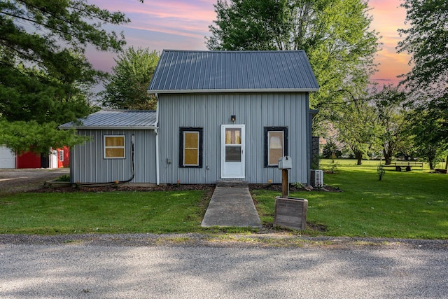 14552 Snyder Rd, Richwood, OH 43344 - view of front of property with metal roof, a front lawn, and board and batten siding