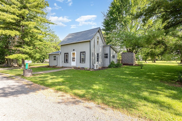 14552 Snyder Rd, Richwood, OH 43344 - view of front of house featuring a front lawn and metal roof