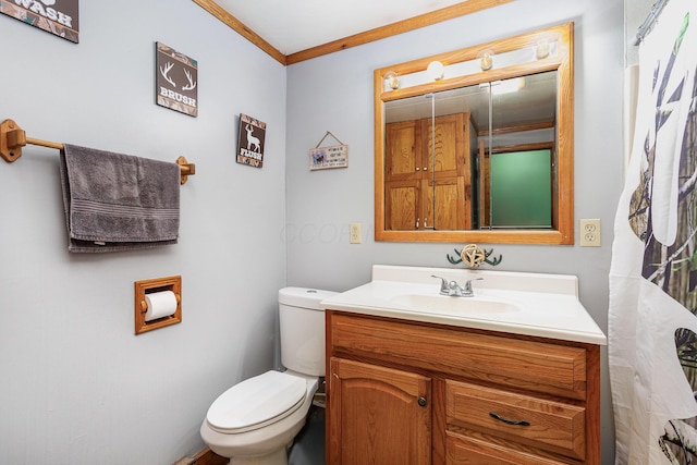 14552 Snyder Rd, Richwood, OH 43344 - bathroom featuring toilet, vanity, and ornamental molding