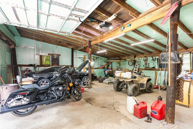 14552 Snyder Rd, Richwood, OH 43344 - garage featuring a garage door opener