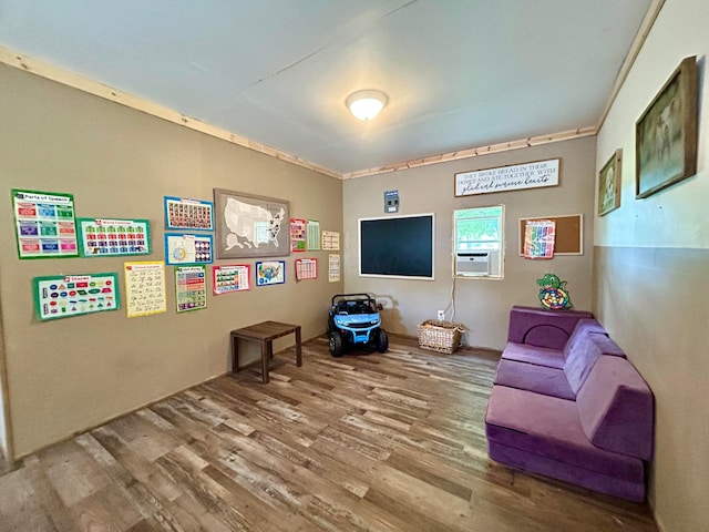 10070 Wolfe Rd, New Vienna, OH 45159 - living area featuring wood finished floors and cooling unit