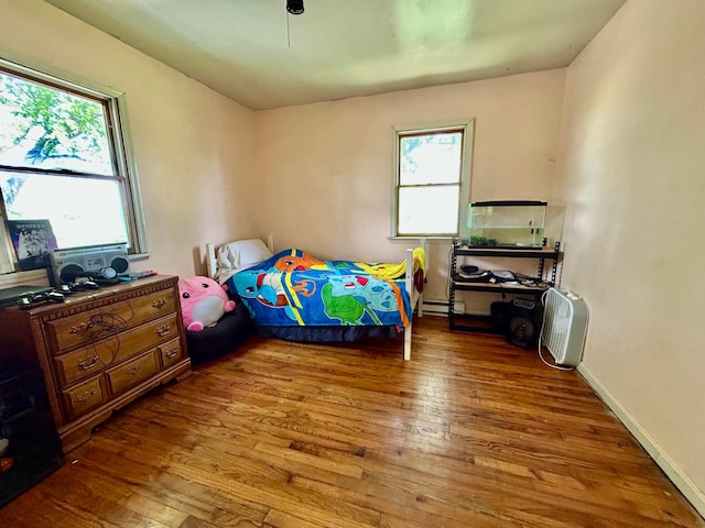 10070 Wolfe Rd, New Vienna, OH 45159 - bedroom featuring wood finished floors