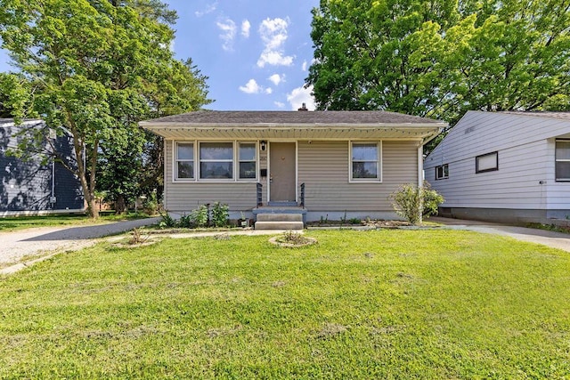 1847 Agler Rd, Columbus, OH 43224 - bungalow-style house featuring a front lawn