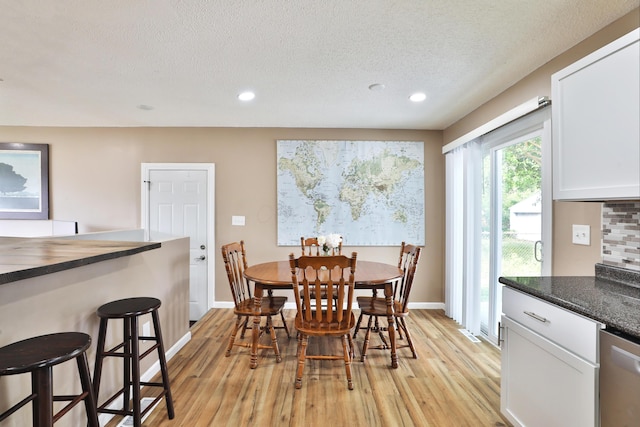 4511 Collingdale Rd, Columbus, OH 43231 - dining area with light wood-style floors, recessed lighting, baseboards, and a textured ceiling