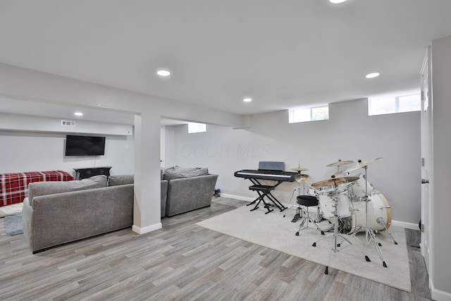 4511 Collingdale Rd, Columbus, OH 43231 - recreation room with wood finished floors, recessed lighting, and baseboards