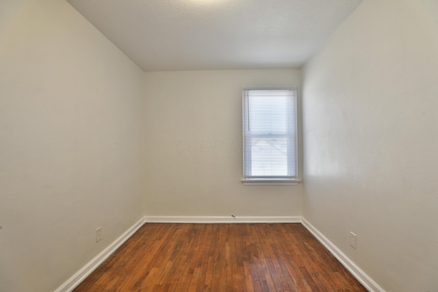 784 E Mithoff St, Columbus, OH 43206 - empty room featuring baseboards and dark wood-type flooring