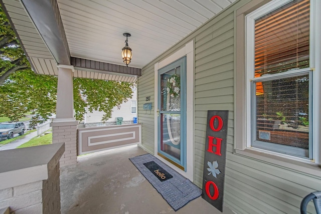 297 E Welch Ave, Columbus, OH 43207 - view of exterior entry with a porch