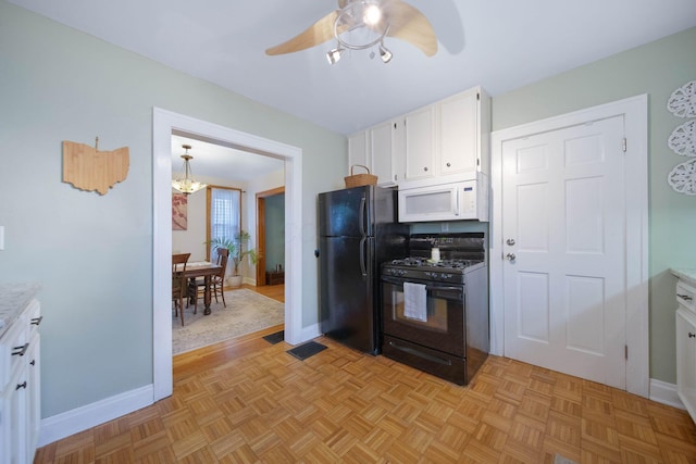 297 E Welch Ave, Columbus, OH 43207 - kitchen featuring black appliances, white cabinetry, and baseboards