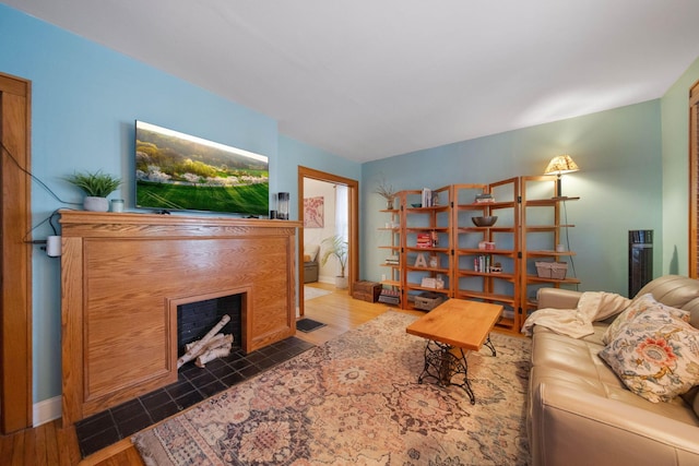 297 E Welch Ave, Columbus, OH 43207 - living room featuring a tiled fireplace