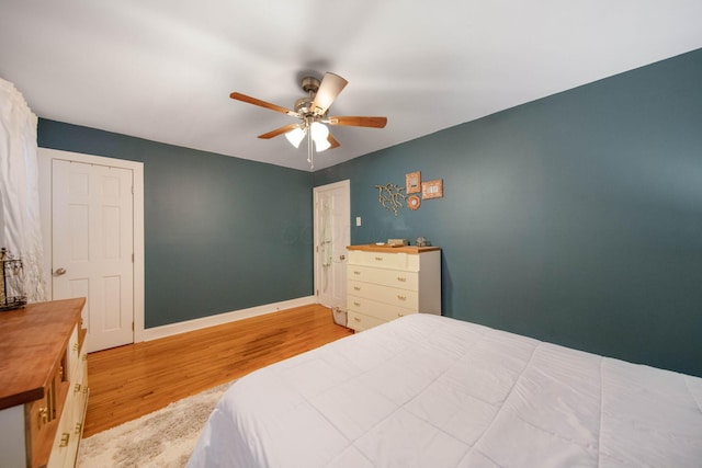 297 E Welch Ave, Columbus, OH 43207 - bedroom featuring wood finished floors, ceiling fan, and baseboards