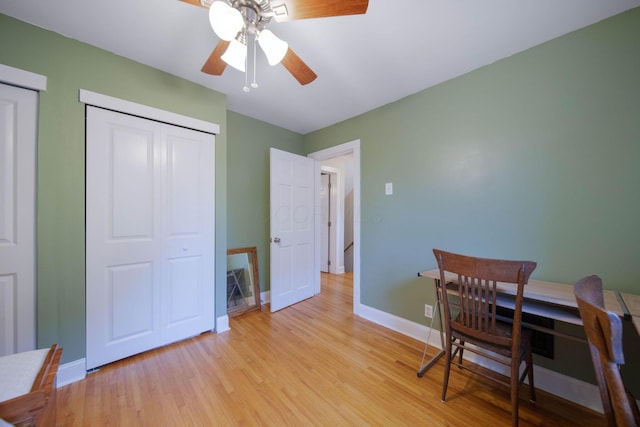 297 E Welch Ave, Columbus, OH 43207 - dining area featuring baseboards, light wood-style floors, and a ceiling fan