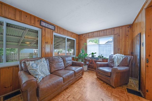 297 E Welch Ave, Columbus, OH 43207 - living area with wooden walls