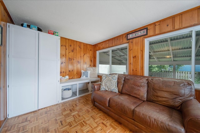 297 E Welch Ave, Columbus, OH 43207 - living room with wood walls