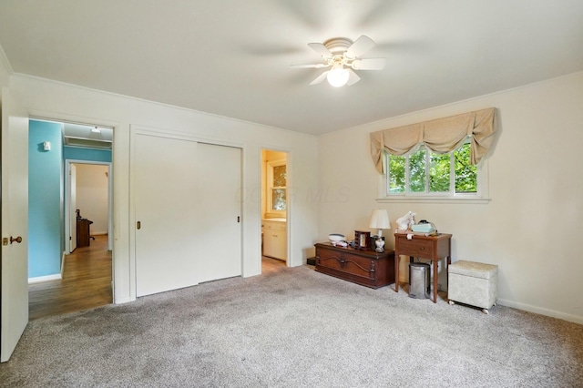1120 Morning St, Worthington, OH 43085 - bedroom with carpet, baseboards, ceiling fan, ensuite bathroom, and a closet
