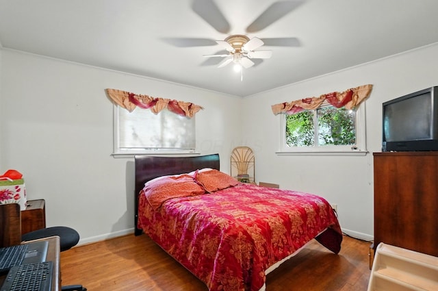 1120 Morning St, Worthington, OH 43085 - bedroom featuring wood finished floors, baseboards, and ceiling fan