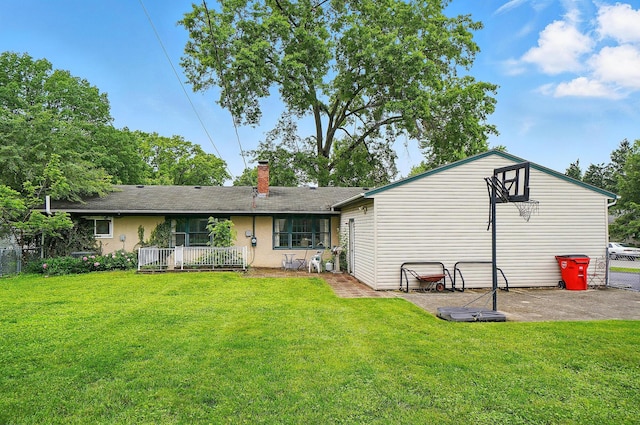 1120 Morning St, Worthington, OH 43085 - back of property featuring a chimney and a patio area