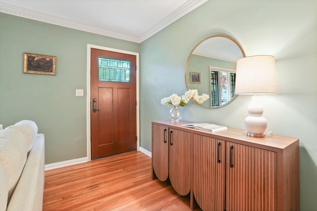 2314 Woodstock Rd, Columbus, OH 43221 - foyer featuring light wood finished floors, ornamental molding, and baseboards
