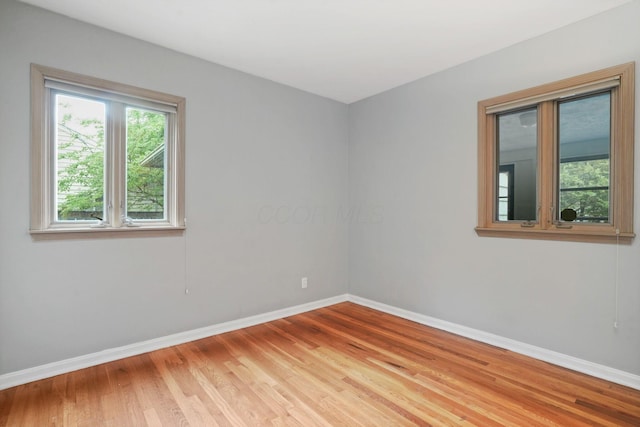 2314 Woodstock Rd, Columbus, OH 43221 - spare room with baseboards and light wood finished floors