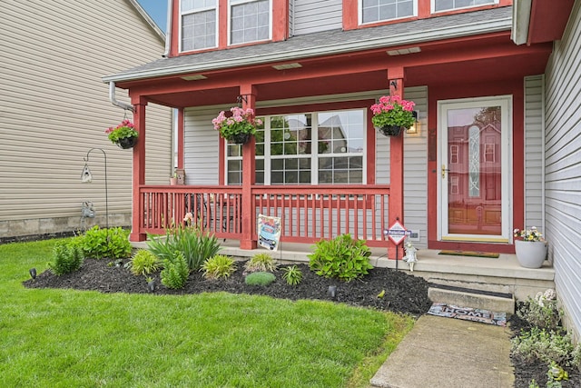 5046 Rolling Rock Ct, Columbus, OH 43229 - property entrance with covered porch, a lawn, and roof with shingles
