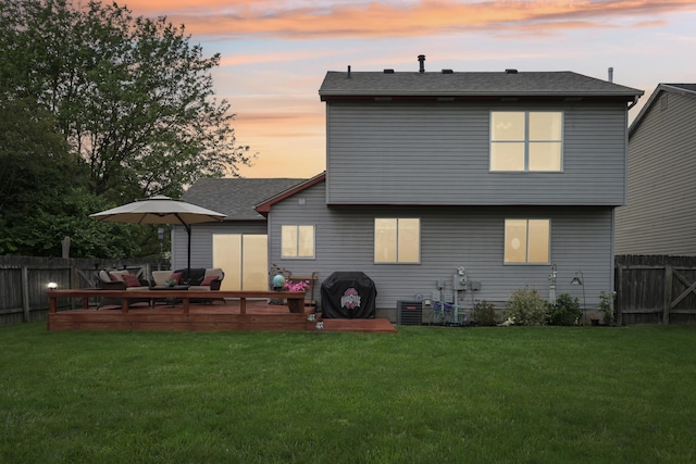 5046 Rolling Rock Ct, Columbus, OH 43229 - rear view of house featuring a deck, central AC unit, an outdoor living space, and roof with shingles