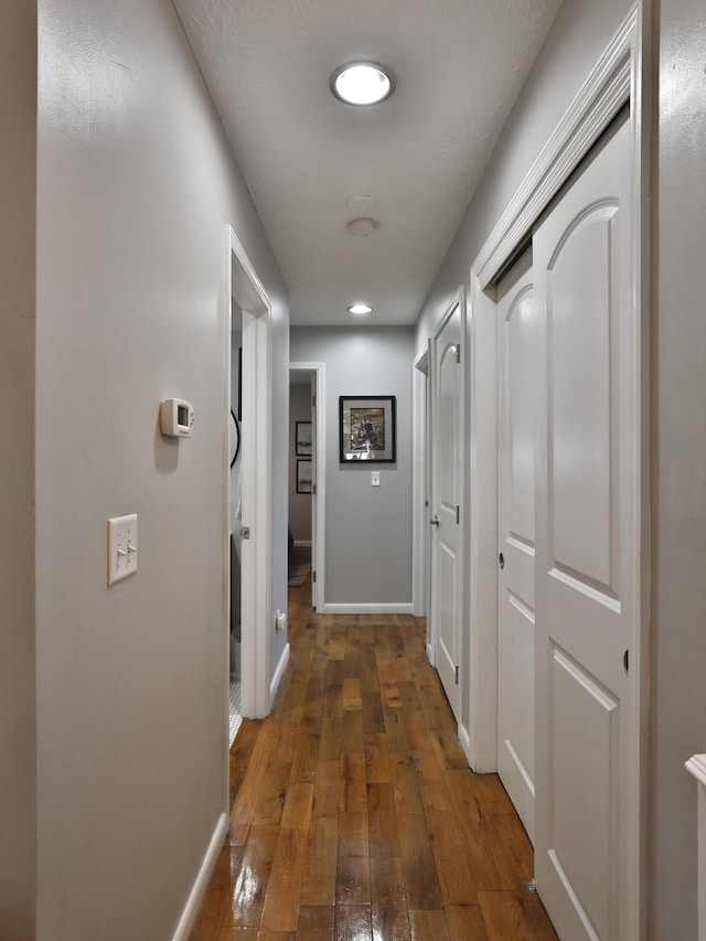7775 Pembrook Dr, Reynoldsburg, OH 43068 - hall with baseboards and wood-type flooring