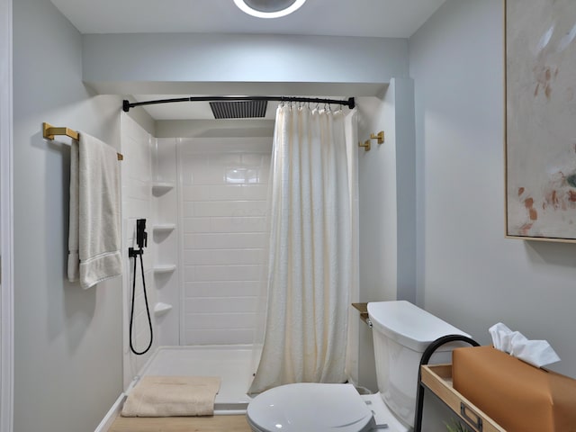 7775 Pembrook Dr, Reynoldsburg, OH 43068 - full bath featuring toilet, a shower stall, and wood finished floors