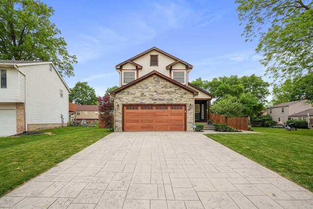336 Saint Thomas Dr, Westerville, OH 43081 - view of front of home with stone siding, a garage, driveway, and a front yard