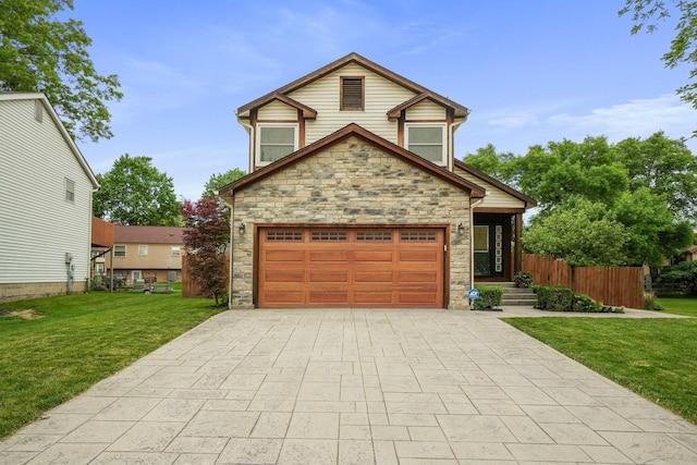 336 Saint Thomas Dr, Westerville, OH 43081 - view of front of property with stone siding and driveway