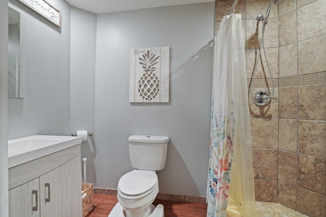 336 Saint Thomas Dr, Westerville, OH 43081 - full bathroom featuring a shower stall, toilet, vanity, and wood finished floors