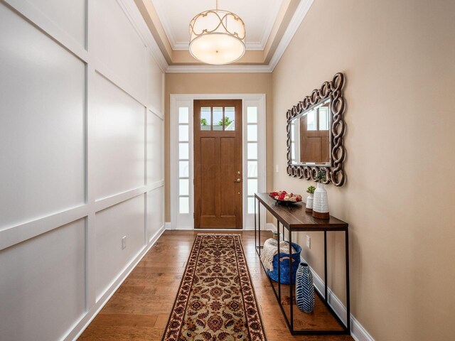 11465 Canby Ct, Plain City, OH 43064 - entryway with crown molding, wood finished floors, and baseboards