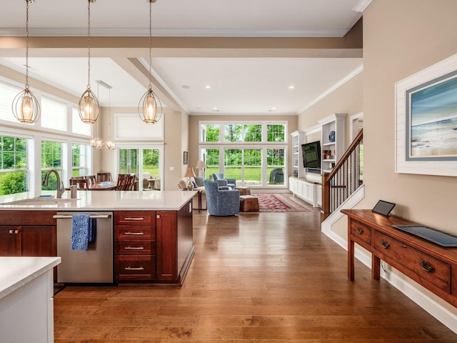 11465 Canby Ct, Plain City, OH 43064 - kitchen featuring dishwasher, open floor plan, light countertops, dark wood-style floors, and crown molding