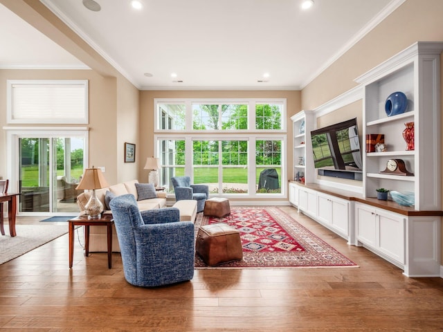 11465 Canby Ct, Plain City, OH 43064 - living area with crown molding, light wood finished floors, and recessed lighting