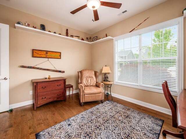 11465 Canby Ct, Plain City, OH 43064 - living area featuring a ceiling fan, wood finished floors, and baseboards