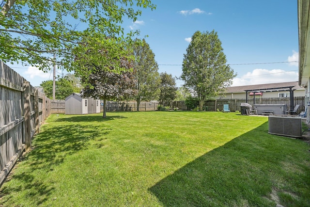 268 Southwood Rd, West Jefferson, OH 43162 - view of yard featuring a hot tub and central air condition unit