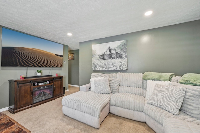 268 Southwood Rd, West Jefferson, OH 43162 - living area with light colored carpet, baseboards, recessed lighting, and a textured ceiling