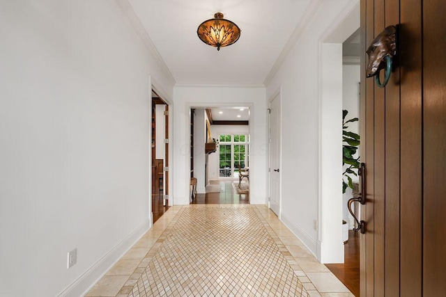2989 Old Path Rd, Blacklick, OH 43004 - hallway featuring inlaid floor details, crown molding, light tile patterned floors, and baseboards